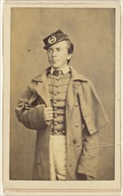 Civil War soldier standing, one hand grasping his overcoat; Charles DeForest Fredricks, American, 1823 - 1894, 1862; Albumen