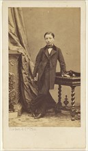 little boy standing, holding a book; Disdéri & Cie; 1862 - 1866; Albumen silver print