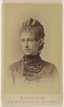 woman wearing a beaded and fringed necklace, printed in vignette-style; Kuhn & Cummins, American, about 1873 - 1881, 1870