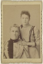 Mother seated, daughter standing; 1875 - 1880; Albumen silver print