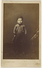 little boy in native costume, standing; Robert Jefferson Bingham, British, 1824 - 1870, about 1865; Albumen silver print