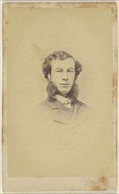 man with extremely long muttonchops, printed in vignette-style; 1865-1870; Albumen silver print