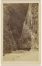 View of an enclosed mountain canyon with river and bridge; Thomas Boulanger & Cie; 1865-1875; Albumen silver print