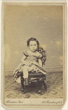 little girl seated in a small chair; Johnston Brothers R.G. & ? Johnston; 1870-1880; Albumen silver print