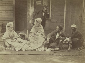 Men and women smoking; Egyptian; about 1865 - 1875; Albumen silver print