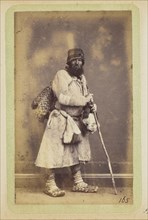 Bearded man with walking stick; William Carrick, Scottish, 1827 - 1878, Russia; about 1860 - 1870; Albumen silver print