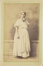 Woman posing in apron and bonnet; William Carrick, Scottish, 1827 - 1878, Russia; about 1860 - 1870; Albumen silver print
