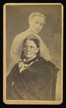 woman seated with a female  spirit  in background; William H. Mumler, American, 1832 - 1884, 1862 - 1875; Albumen silver print