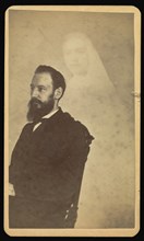 bearded man seated, a female  spirit  in the background; William H. Mumler, American, 1832 - 1884, Boston, Massachusetts