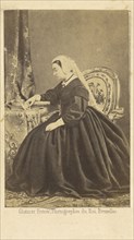 Portrait of Queen Victoria seated, gazing at a photograph of Prince Albert; Ghémar Frères, active 1860s, Brussels, Belgium