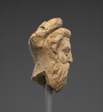 Head of a Bearded Man; Taras, Tarentum, South Italy; 300 - 250 B.C; Terracotta; 11.5 × 8.2 cm 4 1,2 × 3 1,4 in