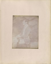 Profile portrait of a Seated Man in Feathered Cap; British, active India about 1843; India; 1843 - 1845; Salted paper print