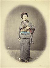 Yakunin's Concubine; Felice Beato, 1832 - 1909, Japan; 1866 - 1867; Hand-colored Albumen silver print