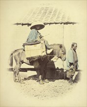 Yakonin Traveling on the Tokaido; Felice Beato, 1832 - 1909, Japan; 1866 - 1867; Hand-colored Albumen