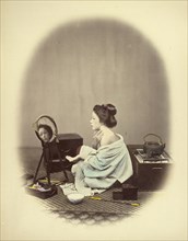 Woman Using Cosmetics; Felice Beato, 1832 - 1909, Japan; 1866 - 1867; Hand-colored Albumen silver print