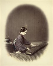 Girl Playing the Koto; Felice Beato, 1832 - 1909, Japan; 1866 - 1867; Hand-colored Albumen silver print