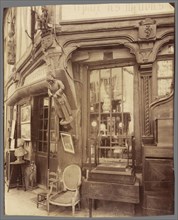 Furniture Store, Compiègne; Eugène Atget, French, 1857 - 1927, Compiègne, France; 1910; Gold toned Albumen silver print
