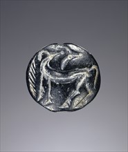 Lentoid engraved seal; Greece; about 1350 B.C. - 1100 B.C; Steatite; 1.7 × 1.8 × 0.9 cm, 11,16 × 11,16 × 3,8 in