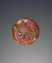 Lentoid engraved seal; Crete, Greece; about 1400 B.C. - 1300 B.C; Carnelian or jasper; 1.5 × 0.9 cm, 9,16 × 3,8 in