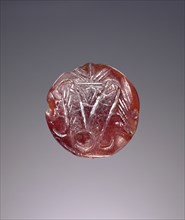 Lentoid engraved seal; Crete, Greece; about 1700 B.C. - 1450 B.C; Carnelian; 0.8 × 1.8 cm, 5,16 × 11,16 in