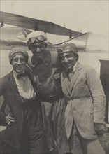 Portrait of three men smiling in front of an airplane; Fédèle Azari, Italian, 1895 - 1930, Italy; 1914 - 1929; Gelatin silver