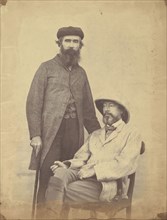 Colonel Yule, standing, and Sir George Yule; India; 1858 - 1869; Albumen silver print