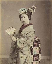 Young Woman with Fan; Kusakabe Kimbei, Japanese, 1841 - 1934, active 1880s - about 1912, Japan; 1870s - 1890s; Hand-colored