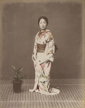 Woman with Potted Plant; Kusakabe Kimbei, Japanese, 1841 - 1934, active 1880s - about 1912, Japan; 1870s - 1890s; Hand-colored