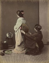 Dressing Obi; Kusakabe Kimbei, Japanese, 1841 - 1934, active 1880s - about 1912, Japan; 1870s - 1890s; Hand-colored Albumen