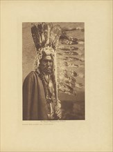 Piegan War-bonnet and Coup-stick; Edward S. Curtis, American, 1868 - 1952, Seattle, Washington, United States; negative 1909