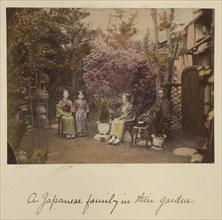 A Japanese family in their garden; Shinichi Suzuki, Japanese, 1835 - 1919, Japan; about 1873 - 1883; Hand-colored Albumen