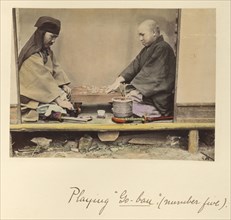 Playing 'Go-bau', number five, Shinichi Suzuki, Japanese, 1835 - 1919, Japan; about 1873 - 1883; Hand-colored Albumen silver