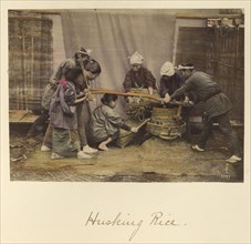 Husking Rice; Shinichi Suzuki, Japanese, 1835 - 1919, Japan; about 1873 - 1883; Hand-colored Albumen silver print