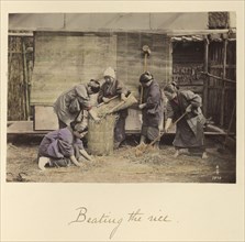 Beating the Rice; Shinichi Suzuki, Japanese, 1835 - 1919, Japan; about 1873 - 1883; Hand-colored Albumen silver print