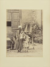 Femme égyptienne à baudet; Félix Bonfils, French, 1831 - 1885, 1870s; Albumen silver print