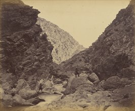 Men on rocks near river; John Burke, British, active 1860s - 1870s, Afghanistan; 1878 - 1879; Albumen silver print