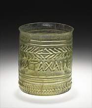Green Cup with a Greek Inscription:  Rejoice and be merry; Eastern Mediterranean; 1st century; Glass; 7.8 x 7.3 cm