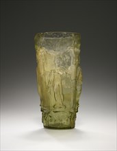 Mythological Beaker; Eastern Mediterranean; second half of 1st century; Glass; 12.5 × 6.1 cm, 4 15,16 × 2 3,8 in