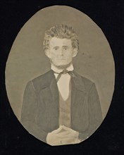 Portrait of a man; American; about 1850 - 1860; Hand-colored salted paper print; 22.6 × 17.8 cm, 8 7,8 × 7 in