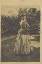 Femme à la raquette, dans un jardin; Fernand Khnopff, Belgian, 1858 - 1921, about 1889; Gelatin silver print; 16.6 x 11.7 cm