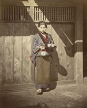 Woman with Tea Tray; Felice Beato, 1832 - 1909, Japan; 1863 - 1868; Hand-colored Albumen silver print