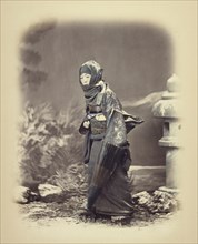 Woman in Winter Dress; Felice Beato, 1832 - 1909, Japan; about 1868; Hand-colored Albumen silver print