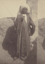 Portrait of a Young Native Man Standing Against a Pillar; Théodule Devéria, French, 1831 - 1871, France; 1865; Albumen silver