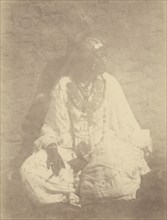 Portrait of a Native Woman Sitting Against a Wall; Théodule Devéria, French, 1831 - 1871, France; 1865; Albumen silver print