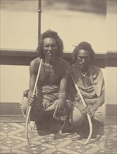 Portrait of Two Native Men Sitting on a Boat Holding Long Curved Sticks; Théodule Devéria, French, 1831 - 1871, France; 1865
