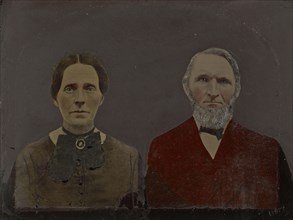 Portrait of man and woman; United States; 1860s - 1880s; Hand-colored tintype; Sheet: 19.4 x 25.5 cm, 7 5,8 x 10 1,16 in