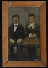 Portrait of seated couple; United States; 1860s - 1880s; Hand-colored tintype; 20.5 x 12.7 cm, 8 1,16 x 5 in