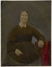 Portrait of woman; United States; 1860s - 1880s; Hand-colored tintype; Sheet: 21.5 x 16.4 cm, 8 7,16 x 6 7,16 in