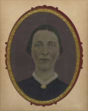 Portrait of woman; United States; 1860s - 1880s; Hand-colored tintype; Sheet: 21 x 16.1 cm, 8 1,4 x 6 5,16 in