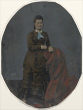 Portrait of young woman; United States; 1860s - 1880s; Hand-colored tintype; Sheet: 21.2 × 16.2 cm, 8 3,8 × 6 3,8 in